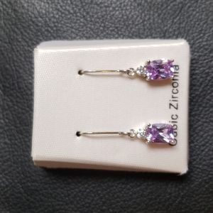 Ladies lavender CZ pierced drop earrings, New in box.